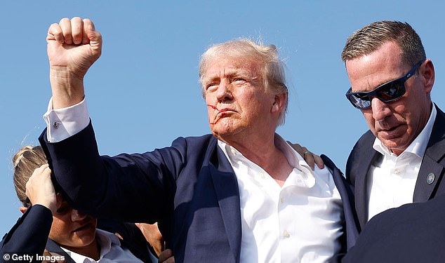 Trump was escorted off the stage by U.S. Secret Service agents after being struck by a bullet during a rally in Pennsylvania on July 13