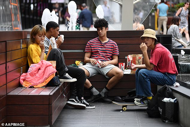 Generation Z adults, born after 1997, are less likely to pay off a mortgage but have the least savings because they are more likely to rent or pay off student loans (pictured are youth in Brisbane)