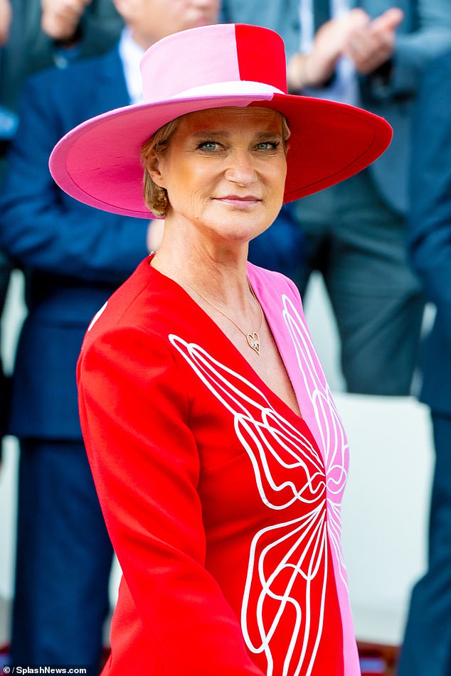 Princess Delphine, 55, the love child of former King Albert II of Belgium, wore a striking outfit earlier this month when she attended the national day celebrations