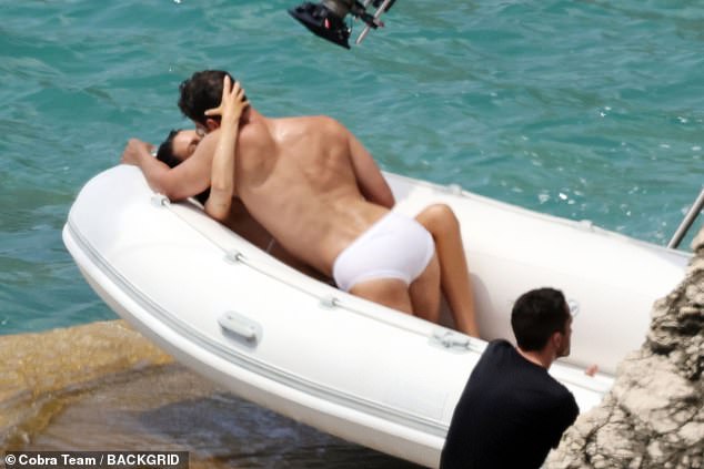 Theo James, 39, put on a racy display on Monday while filming a new Dolce & Gabbana commercial starring Vittoria Ceretti on the Italian island of Capri