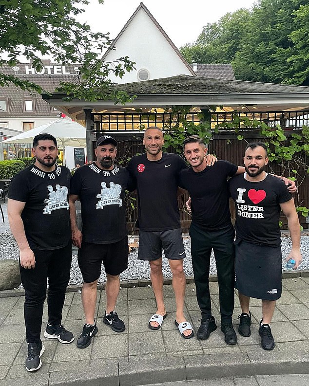 Turkey's stars (pictured Cenk Tosun) celebrated reaching the quarter-finals of Euro 2024 by ordering 300 doner kebabs from their hotel in Germany