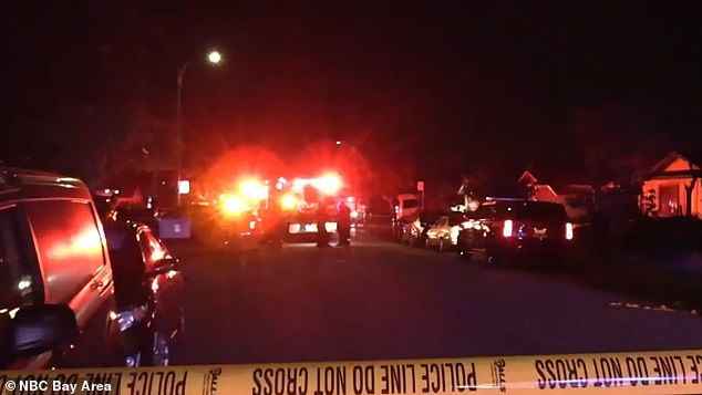 Police were called to the 400 block of Kitty Hawk Road in Alameda, California, Wednesday night after a resident reported his neighbor had been shot. Officers are pictured at the scene