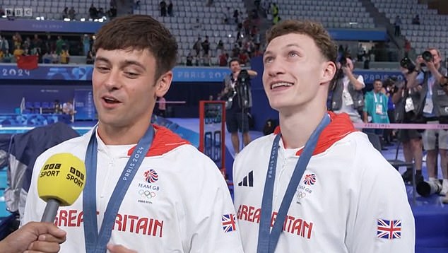 Tom Daley's (left) diving partner Noah Williams (right) burst into tears after the pair won a silver medal at the Olympic Games