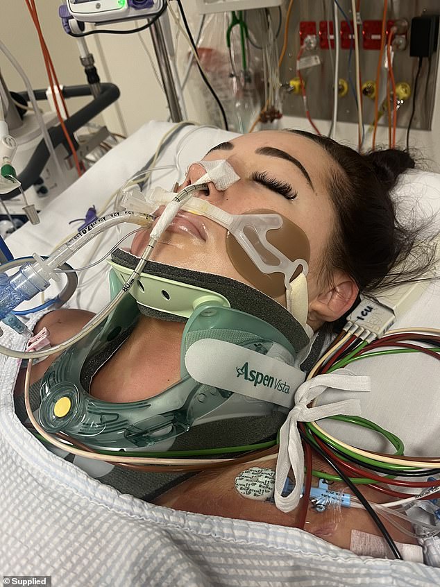 Tominey Reid (pictured in hospital after her fall) fell seven stories from her balcony in July 2023