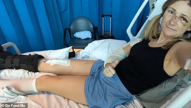 A traveller is facing a $15,000 medical bill after breaking her leg in three places when she crashed a moped into a bus while on holiday in Queensland