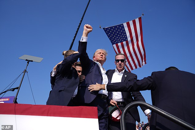 Ronny L Jackson met Trump, 78, in Bedminster, New Jersey after his near-death experience to 'personally check on him'. He said: 'I am extremely grateful that his life was spared. 'It was an absolute miracle that he was not assassinated.'