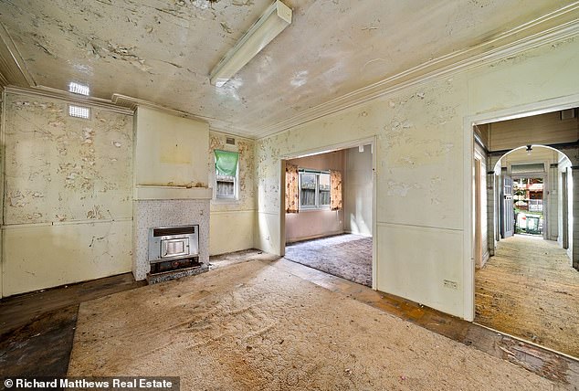 Selling agent Matthew Blackmore said there are holes in the ceiling, the floor is very old wood and you have to be careful where you walk
