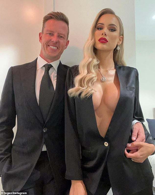 V8 Supercars star James Courtney (pictured with wife Tegan) has swapped burning rubber for selling houses