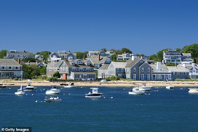 Home prices on Massachusetts' Billionaires' Isle (pictured) are plummeting due to the growing threat of beach erosion and water damage