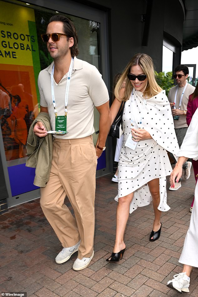 Margot Robbie led the stars at Wimbledon on Friday when she made her first public appearance since announcing she is expecting her first child with husband Tom Acklerley