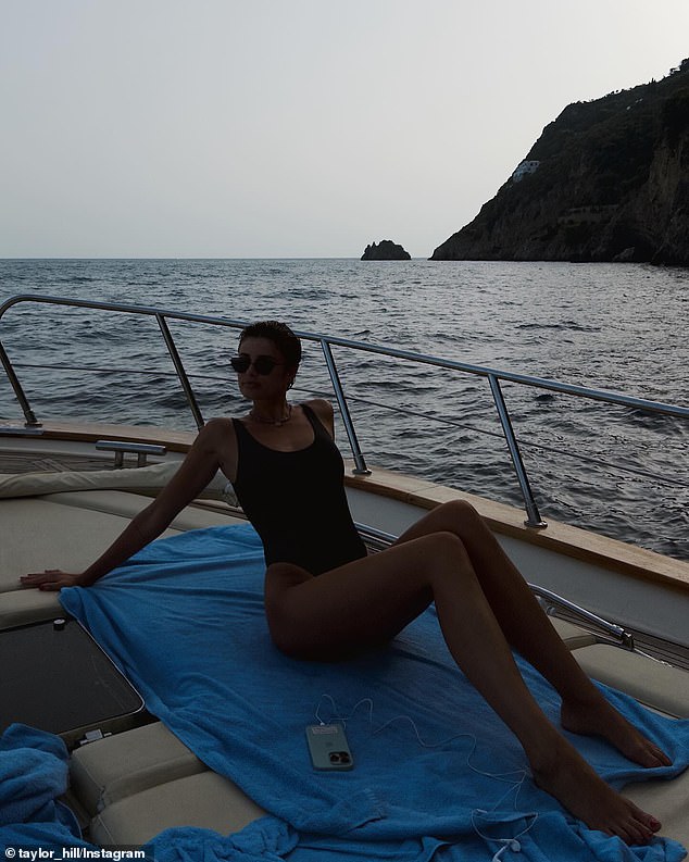 She showed off her slim figure while sitting on a boat