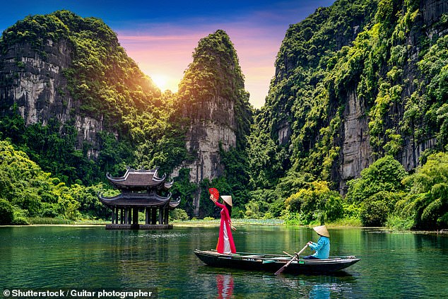 Idyllic: But postcard-perfect Vietnam is actually one of the world's few engines of economic growth