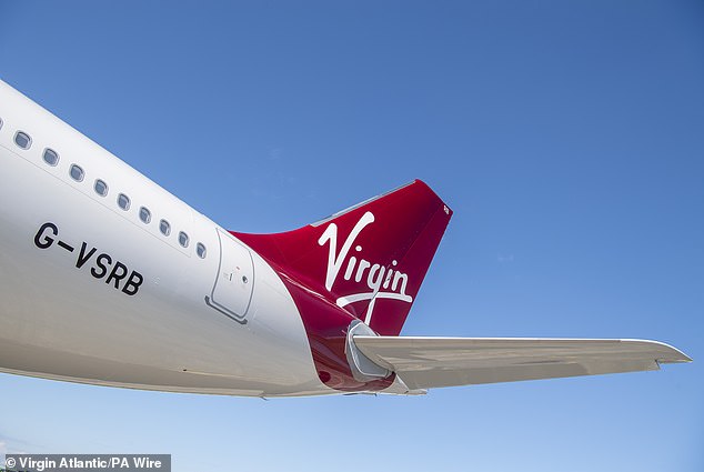 The passenger collapsed on the Virgin Australia flight at around 9:30 a.m. Monday