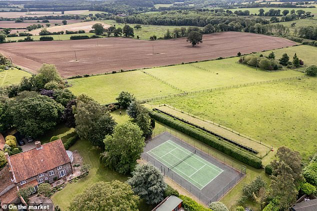 Anyone up for a game of tennis? Town Farm in Norfolk has a large grounds and a tennis court