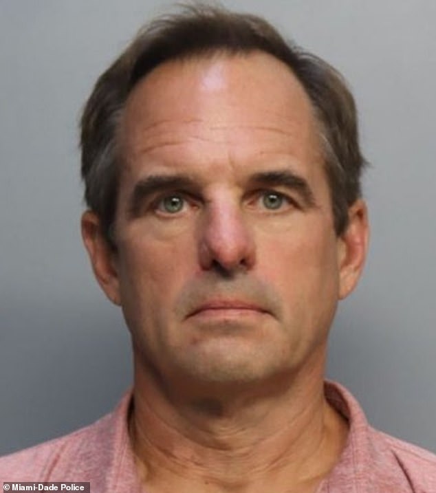 Andrew Cobb, 54, was arrested in Miami, Florida on Monday after he hit a cyclist in the face with a water bottle while he was jogging on a bike path on July 7.