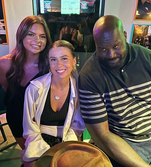 Shaquille O'Neal (right) and 'Hawk Tuah' girl Haliey Welch (center) had one of the most unlikely encounters you'll ever see in Nashville on Sunday