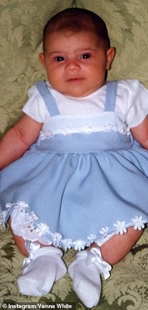 One of the photos showed Gigi as a baby in a blue dress