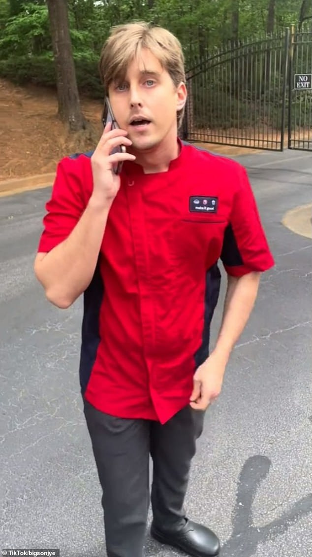 In the video, which was shared on TikTok in April, the fast food worker can be seen arguing outside the entrance gate of a complex in Georgia