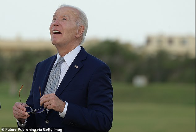 Biden wandered off during paratrooper rally at annual G7 meeting and was directed by Italian prime minister