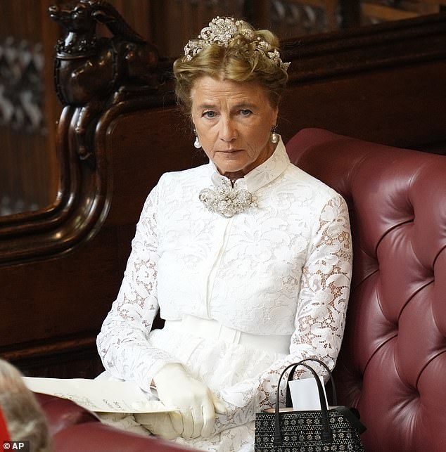 Dressed in a delicate white lace dress with cream gloves, large pearl earrings and a dazzling brooch, Antonia, 69, looked every inch the duchess at the State Opening of Parliament today