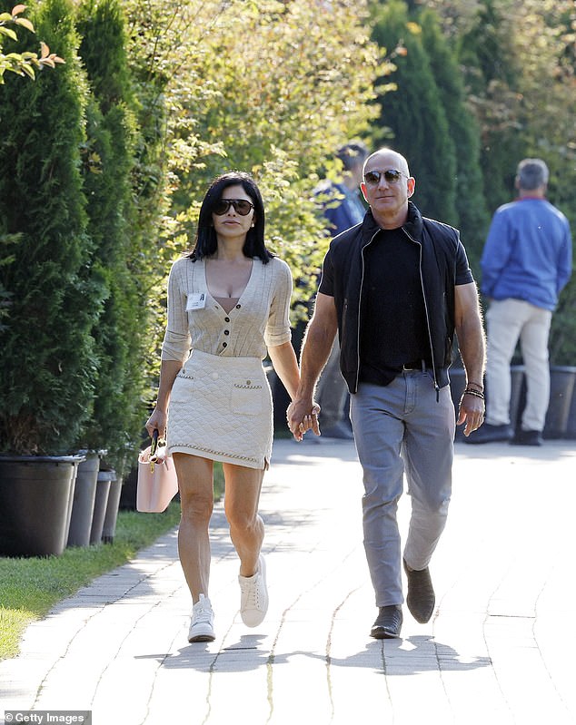 Newly unearthed documents reveal that one of Amazon's most iconic products is a huge money-spinner. (Pictured: Amazon founder Jeff Bezos and his fiancée Lauren Sanchez in Sun Valley, Idaho earlier this month)