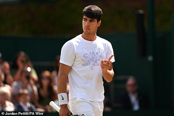 Carlos Alcaraz trains on court 14 ahead of the Gentlemen Final against Novak Djokovic (not pictured) on day 14 of the 2024 Wimbledon Championships at the All England Lawn Tennis and Croquet Club, London. Date photo taken: Sunday 14th July 2024. PA photo. See PA story TENNIS Wimbledon. Photo credits must read: Jordan Pettitt/PA Wire. RESTRICTIONS: Editorial use only. No commercial use without prior written permission from the AELTC. Use of still images only - no moving images to simulate broadcast. No superimposition or removal of sponsor/advertising logos.