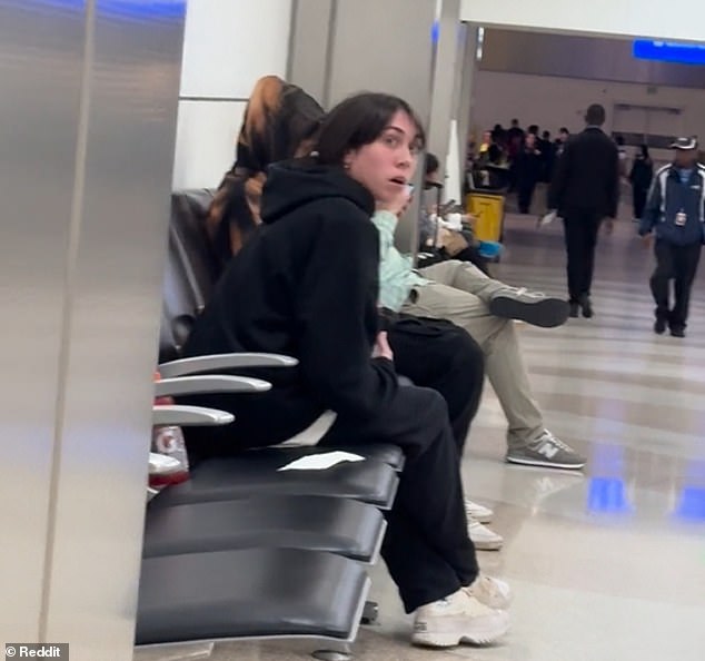 Newly released footage of a woman angrily yelling at her boyfriend in a Fort Lauderdale airport waiting area has shocked Redditors