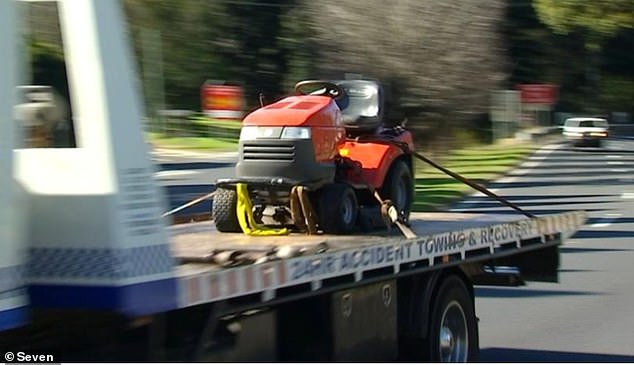 Detectives on Tuesday collected evidence from the home (including the lawn mower, pictured) that has now been declared a crime scene