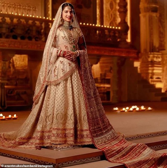 Radhika Merchant pictured in her wedding dress, known as a lengha