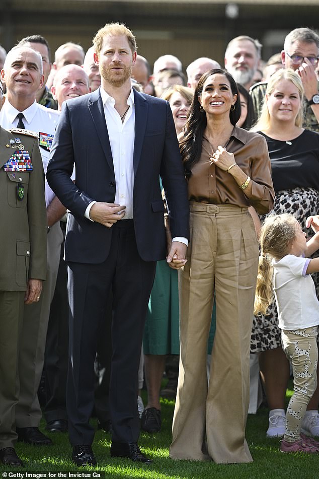 Pictured: Meghan Markle wore floor-length pants for the Invictus Games in Germany in September 2023