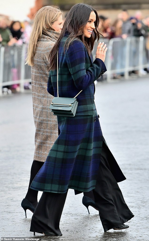 Meghan Markle wore floor-length trousers when she visited Edinburgh Castle during her first official joint visit to Scotland with Prince Harry in February 2018