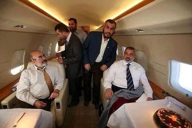 Haniyeh (right in photo) accompanied other senior Hamas officials in a private jet, undated