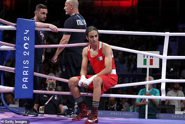 Controversial Algerian fighter Imane Khelif (center) clashed with Carini in this morning's Olympic welterweight bout