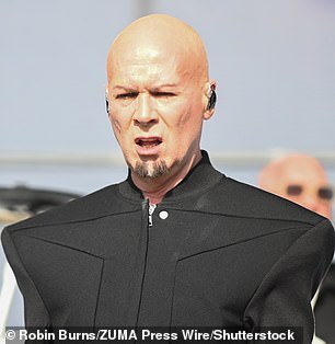 The group looked worlds different from when they were younger, as Phil, 68, (pictured) now sports a shaved head