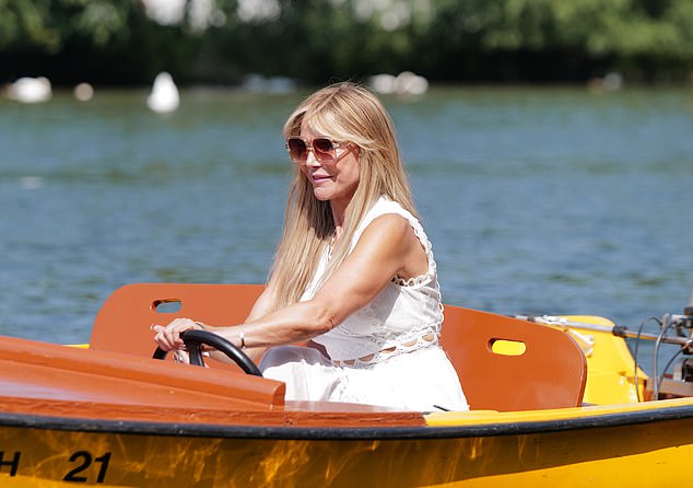 She gracefully jumped onto a brightly coloured motorboat and began taking selfies before speeding down the Thames