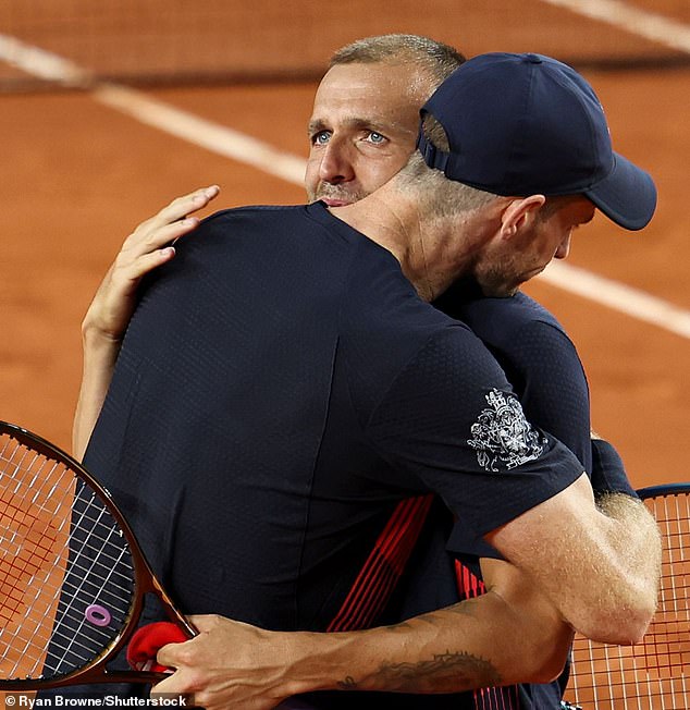 Murray and Evans shed tears as they embraced after the match at Roland Garros