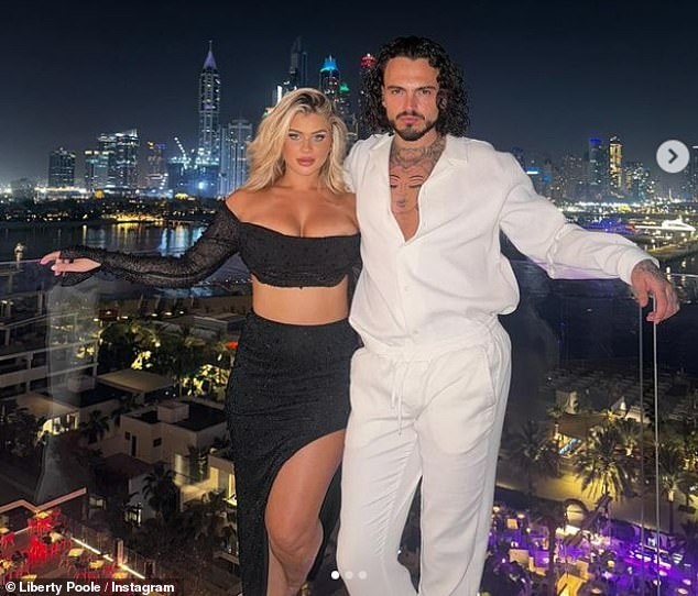 The Love Island star showed off her ample cleavage in the low-cut crop top and made sure to put on a very long show in the skirt with a high slit