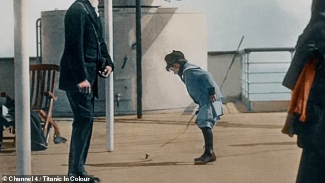 The documentary features photographs taken by Francis Browne - the best record of what life on board must have been like. Pictured: A boy in first class plays with a spinning top