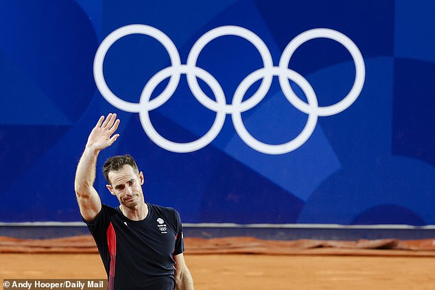 Murray waved goodbye to tennis at Roland Garros with the five Olympic rings behind him