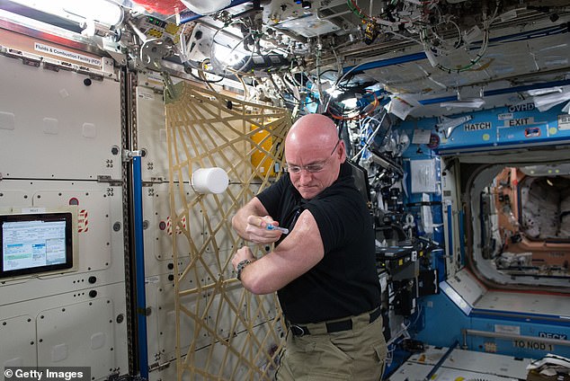 Vice Presidential Immunity: Kelly and his twin brother Scott Kelly (above) participated in a NASA twin study while Scott Kelly was on the International Space Station. Here, Scott Kelly gets a flu shot