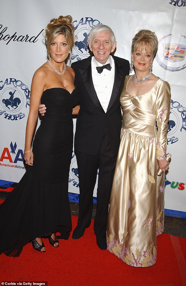 Aaron Spelling passed away in June 2006, leaving behind a $500 million empire, while Tori's estate was $800,000. Tori, Aaron and Candy pictured in 2002 in LA