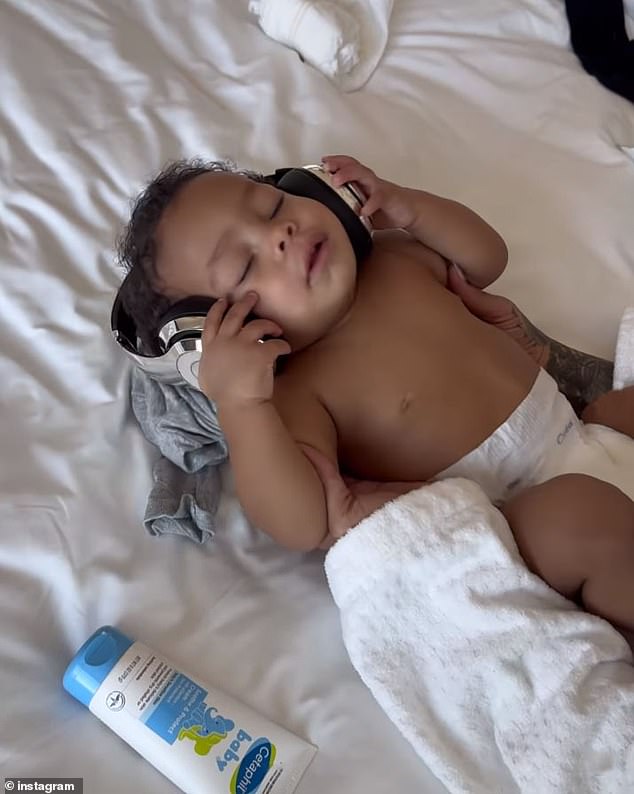 He shared a short clip of baby Riot wearing headphones and a clean diaper after Rihanna changed him