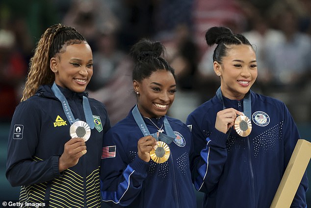 And Biles explained that it was all due to the pressure Rebeca Andrade (left) put on her