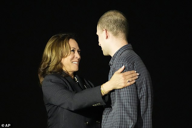 Harris is seen here greeting the wrong captured Wall Street Journal reporter