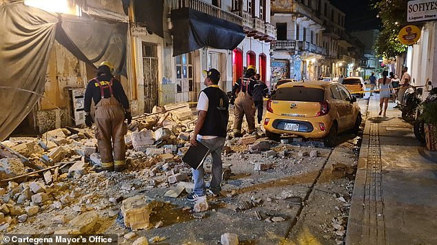 Concrete slabs were strewn across a street in Cartagena's historic Getsemaní neighborhood after a balcony of a building with no tenants collapsed