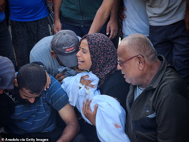 Palestinians mourn their relatives killed in Israeli airstrikes on the eastern areas of Khan Yunis, at Nasser Hospital in Gaza City, Gaza on July 28