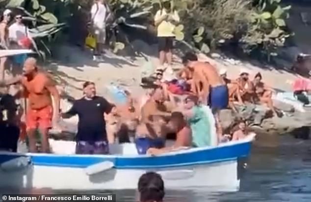 According to witnesses, dozens of men were seen beating each other as they argued over who would take the next ferry home