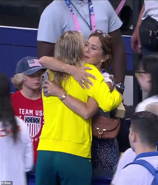 Queen Mary gave Titmus (left) a long hug and the couple had the biggest smiles on their faces as Australians ran to the stands to embrace their friends and loved ones