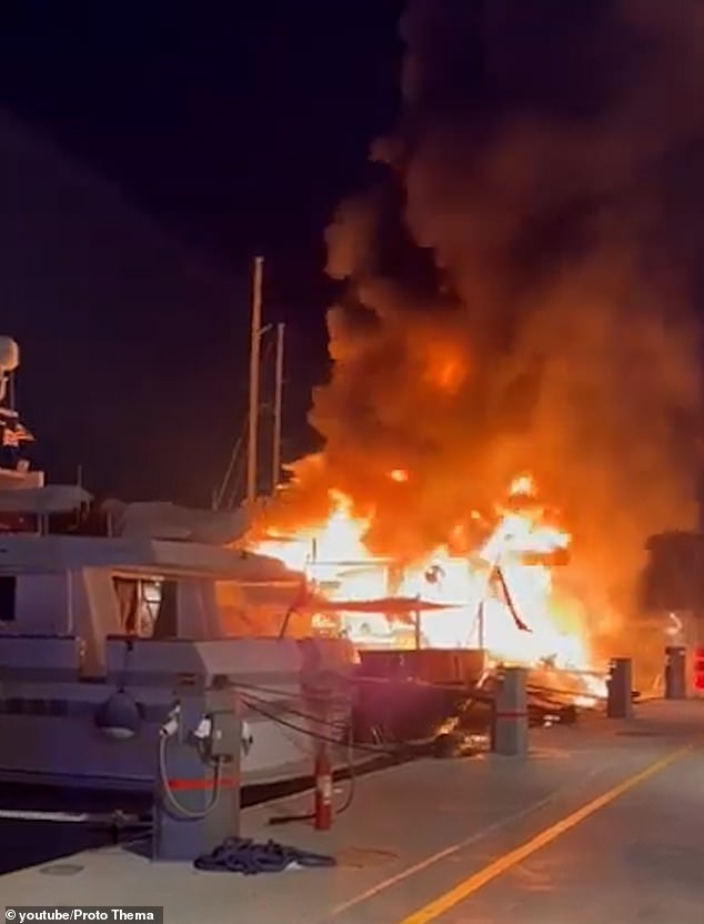 Footage shows the yachts engulfed in flames as black clouds of smoke rise into the sky