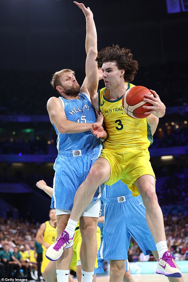 Australia's Josh Giddey had nine points and 10 rebounds after a sluggish first half (pictured: vs. Vasilis Charalampopoulos)